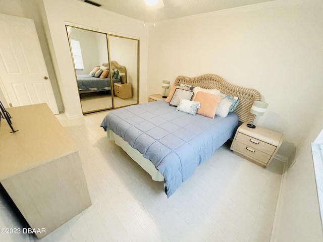 840 Center Ave Unit 840, Daytona Beach, FL 32117 - bedroom featuring a closet and ornamental molding