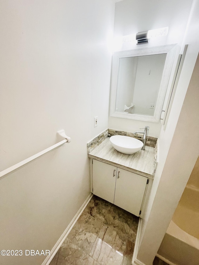 840 Center Ave Unit 840, Daytona Beach, FL 32117 - bathroom with vanity, marble finish floors, and baseboards