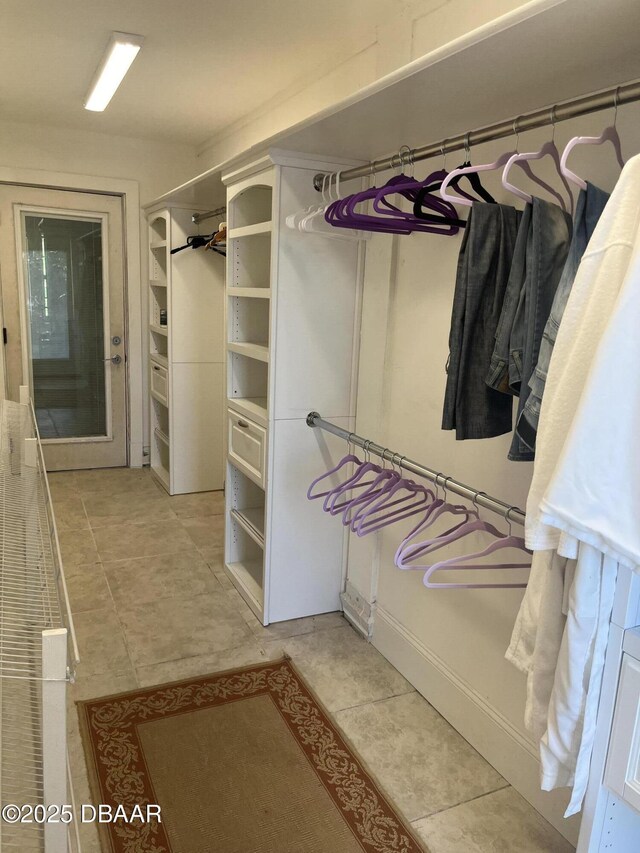 220 John Anderson Dr, Ormond Beach, FL 32176 - spacious closet with light tile patterned floors