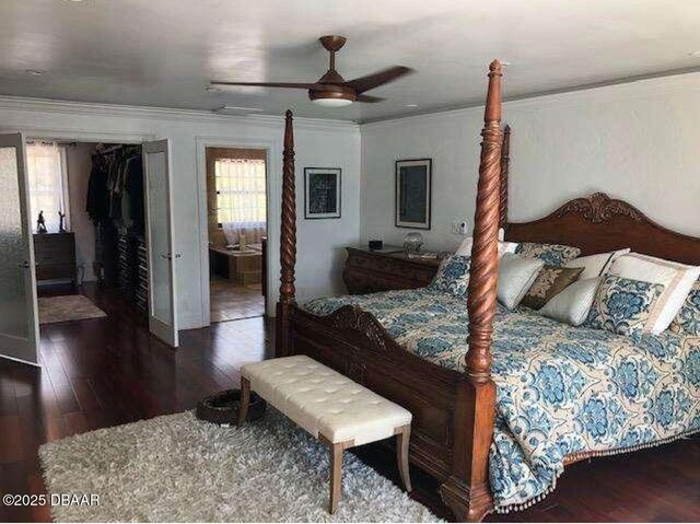 220 John Anderson Dr, Ormond Beach, FL 32176 - bedroom featuring wood finished floors, ornamental molding, ceiling fan, and ensuite bathroom