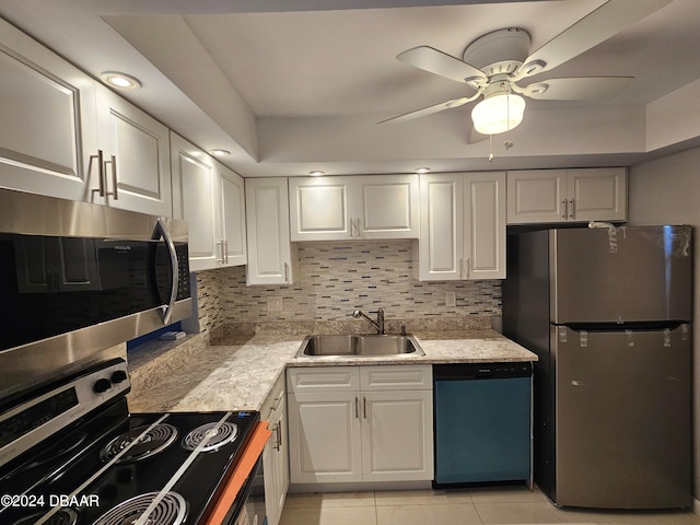 kitchen featuring white cabinetry, appliances with stainless steel finishes, and sink