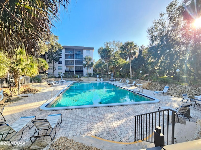 view of pool featuring a patio area