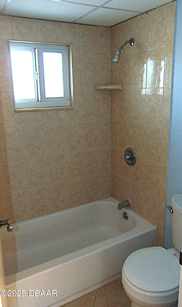100 Silver Beach Ave Unit 308, Daytona Beach, FL 32118 - bathroom featuring toilet, tile patterned floors, and shower / bathing tub combination