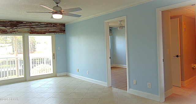 100 Silver Beach Ave Unit 308, Daytona Beach, FL 32118 - spare room featuring ceiling fan, a healthy amount of sunlight, and light tile patterned floors