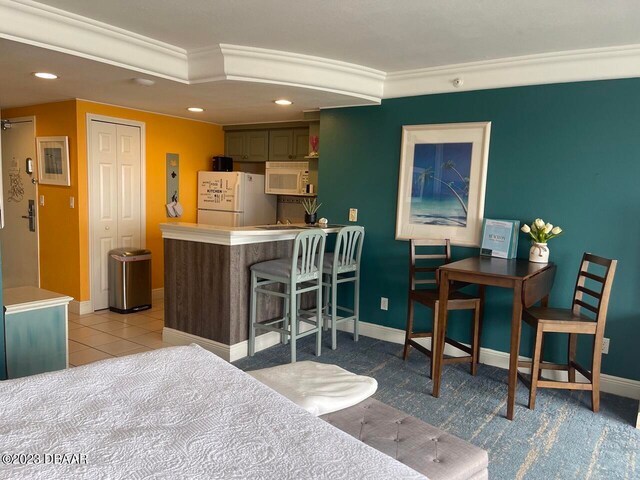 2700 N Atlantic Ave Unit 901, Daytona Beach, FL 32118 - interior space with light tile patterned floors, white refrigerator, and a closet