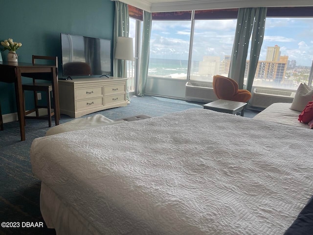2700 N Atlantic Ave Unit 901, Daytona Beach, FL 32118 - bedroom with a wall mounted AC, cooling unit, and carpet