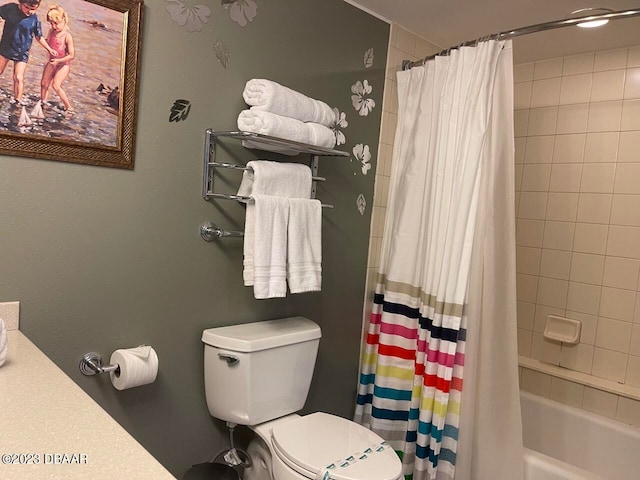 2700 N Atlantic Ave Unit 901, Daytona Beach, FL 32118 - bathroom with shower / bath combo with shower curtain and toilet