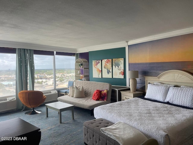 2700 N Atlantic Ave Unit 901, Daytona Beach, FL 32118 - carpeted bedroom featuring ornamental molding and a textured ceiling
