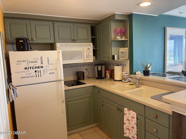2700 N Atlantic Ave Unit 901, Daytona Beach, FL 32118 - kitchen featuring white appliances, sink, and light tile patterned flooring
