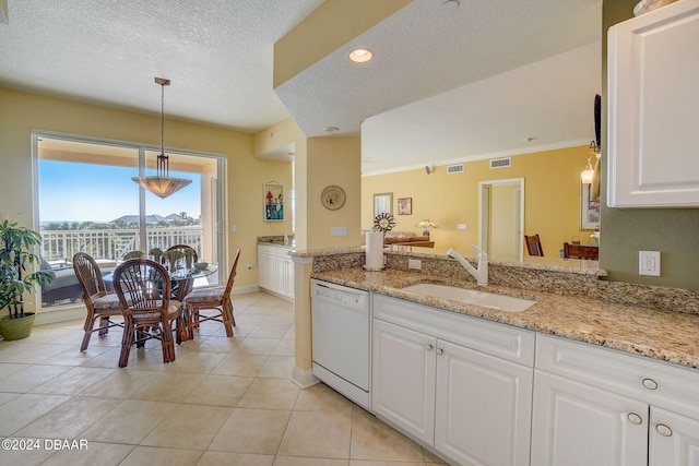 kitchen with white dishwasher, a textured ceiling, sink, light stone countertops, and white cabinetry