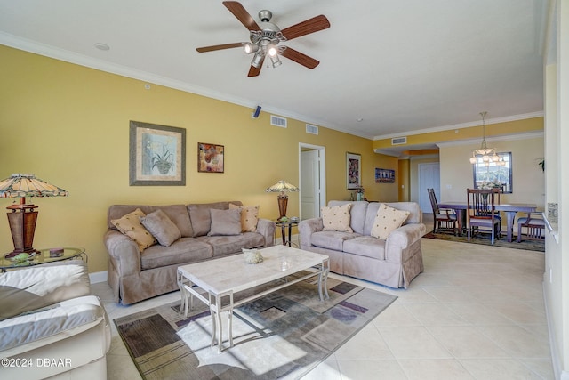 tiled living room featuring ceiling fan with notable chandelier and ornamental molding