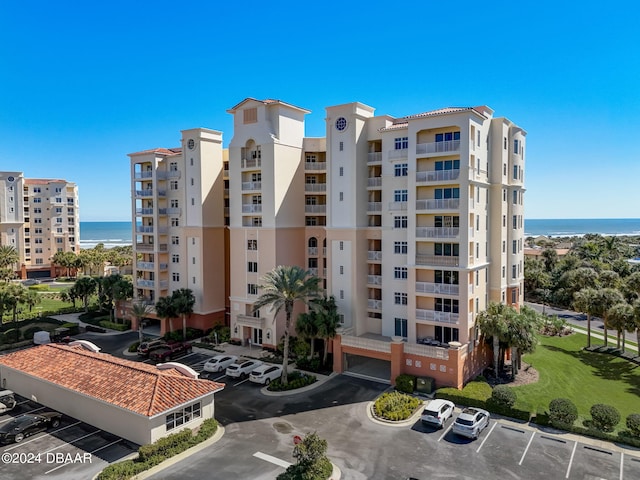 view of property with a water view