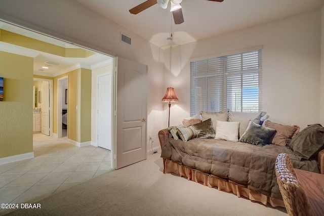 living room featuring ornamental molding, ceiling fan, and light tile patterned floors