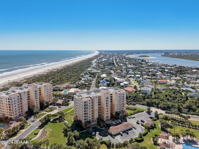 bird's eye view with a view of the beach and a water view