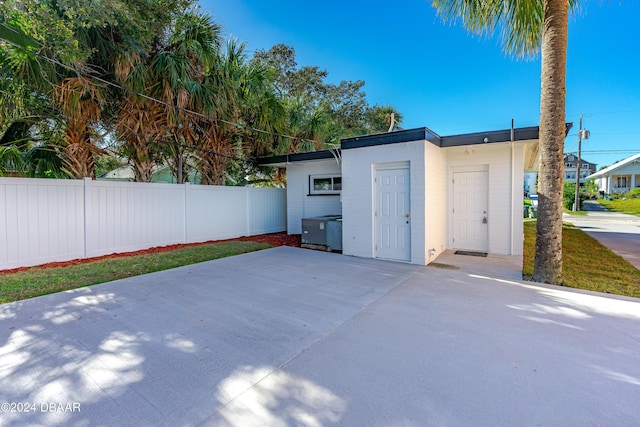 garage featuring fence