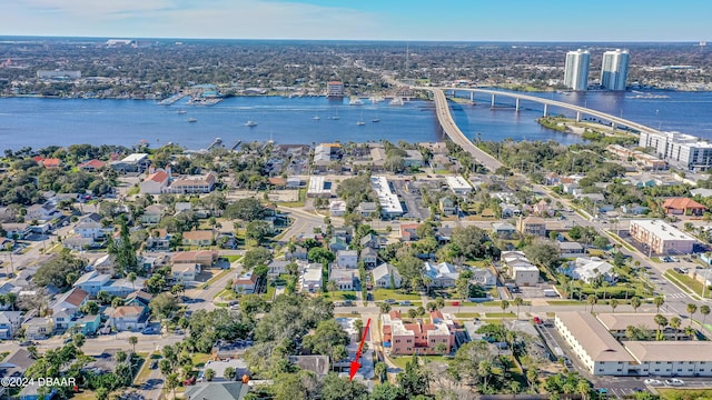 birds eye view of property with a water view