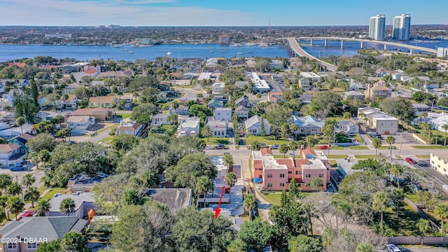 bird's eye view featuring a residential view and a water view