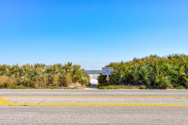 view of road featuring a water view