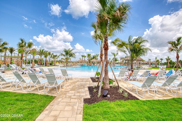 view of swimming pool featuring a patio area