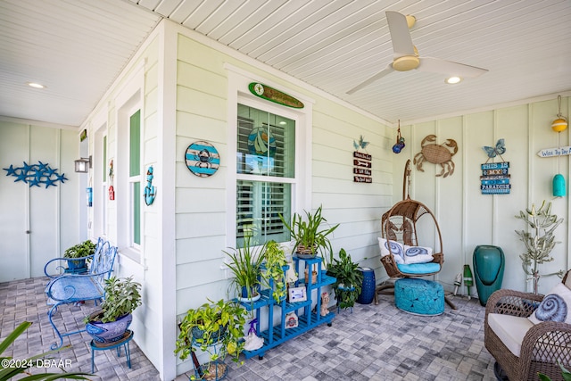 view of patio with covered porch and ceiling fan