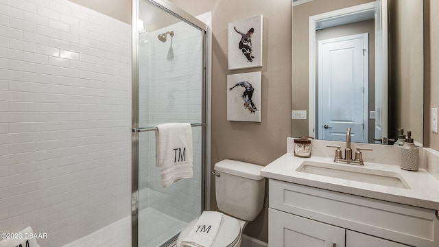 bathroom featuring walk in shower, vanity, and toilet