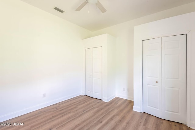 6062 Sabal Crossing Ct, Port Orange, FL 32128 - unfurnished bedroom with light wood-type flooring, baseboards, and ceiling fan