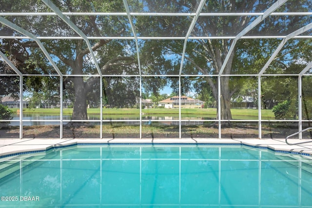 6062 Sabal Crossing Ct, Port Orange, FL 32128 - swimming pool with a lanai, a water view, and a patio