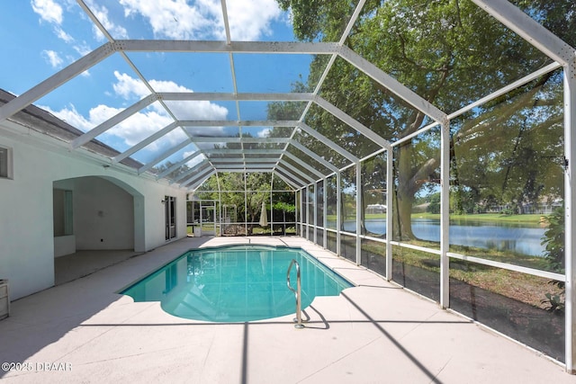 6062 Sabal Crossing Ct, Port Orange, FL 32128 - outdoor pool featuring a patio area, a water view, and glass enclosure
