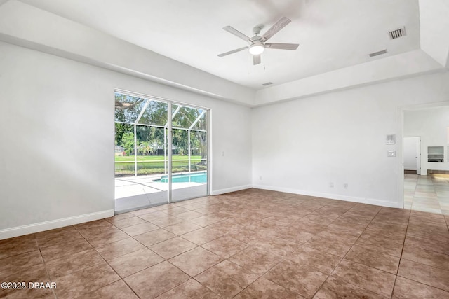 6062 Sabal Crossing Ct, Port Orange, FL 32128 - spare room featuring a ceiling fan, tile patterned flooring, and baseboards