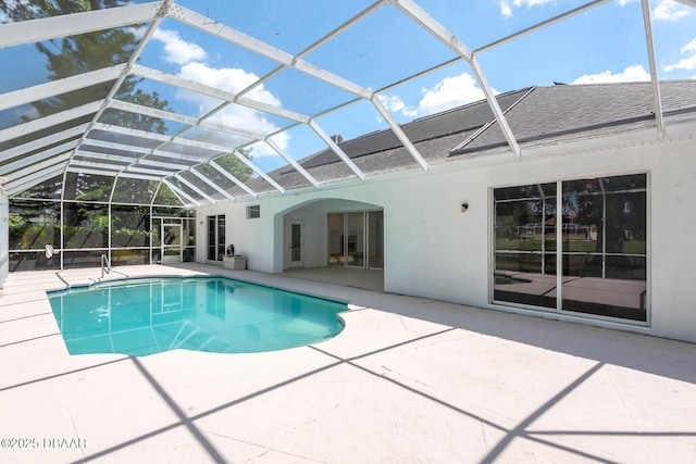 6062 Sabal Crossing Ct, Port Orange, FL 32128 - swimming pool with a patio area and glass enclosure