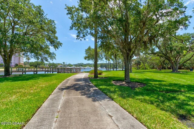 146 Palm Coast Resort Blvd Unit 501, Palm Coast, FL 32137 - view of property's community featuring a water view and a yard