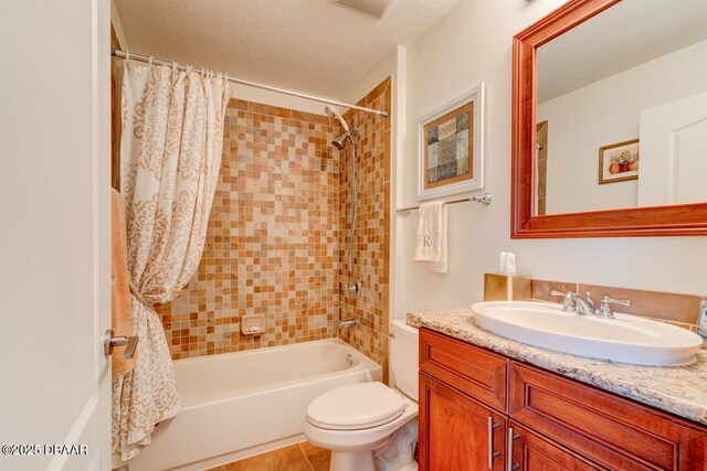 146 Palm Coast Resort Blvd Unit 501, Palm Coast, FL 32137 - bathroom with vanity, shower / bath combination with curtain, a textured ceiling, and tile patterned floors