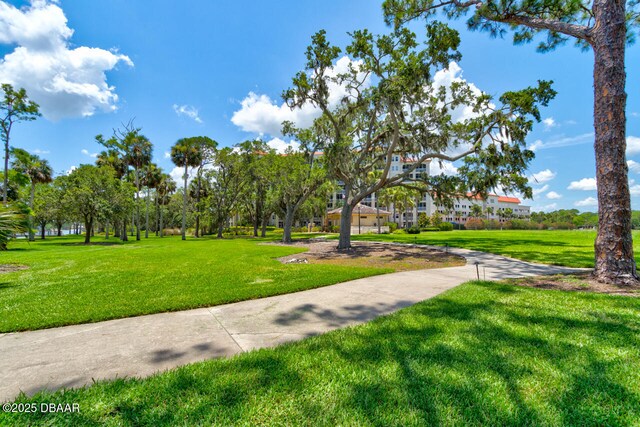 146 Palm Coast Resort Blvd Unit 501, Palm Coast, FL 32137 - view of property's community featuring a yard