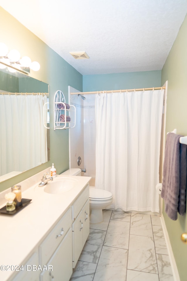 full bathroom featuring vanity, shower / bathtub combination with curtain, and toilet