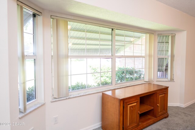 kitchen with white appliances, vaulted ceiling, ceiling fan, and sink