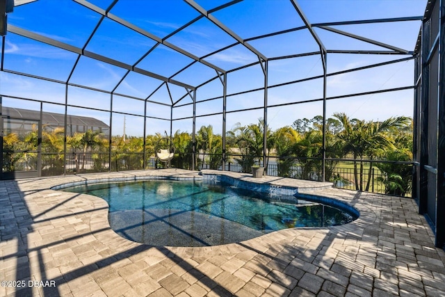 view of pool featuring a lanai and a patio area