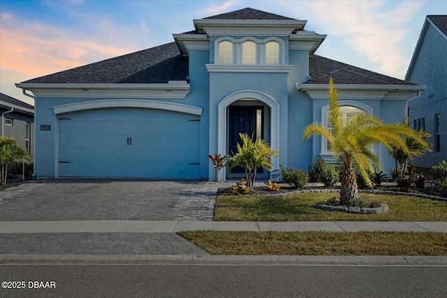 view of front of property featuring a garage