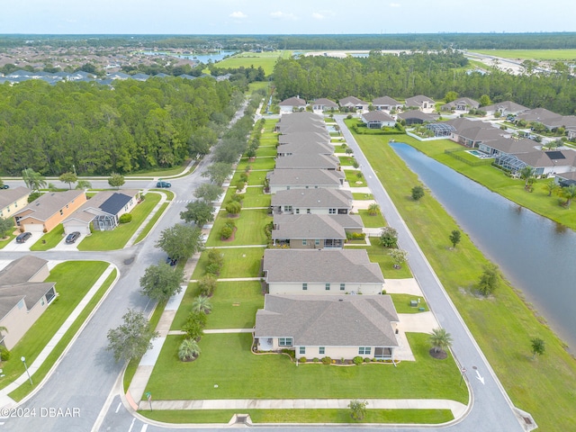 aerial view featuring a residential view and a water view