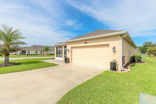 view of front of home featuring an attached garage, a shingled roof, driveway, stucco siding, and a front lawn