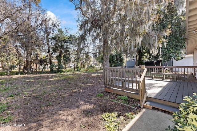 view of yard featuring a deck