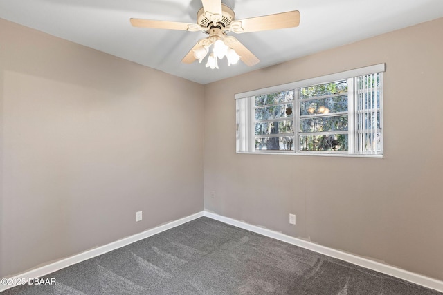 spare room with ceiling fan and carpet flooring