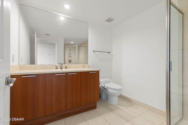 bathroom featuring visible vents, toilet, tile patterned flooring, vanity, and a shower stall