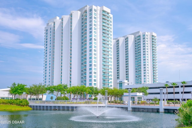 view of building exterior with a water view