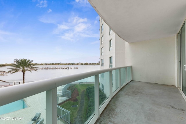 balcony featuring a water view