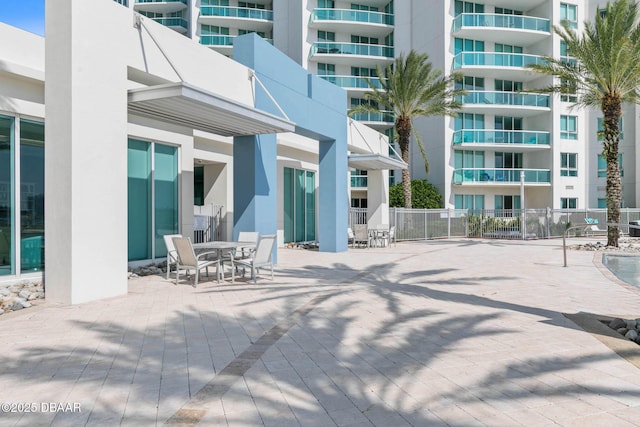 view of patio / terrace featuring fence