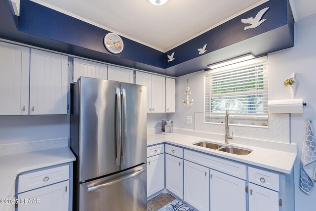 kitchen featuring white appliances and white cabinets