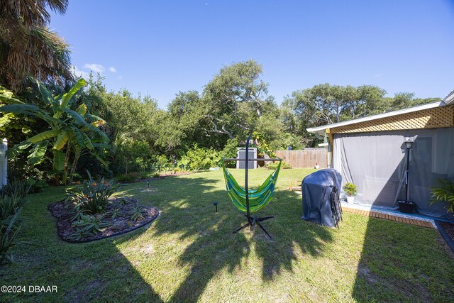 garage featuring a yard