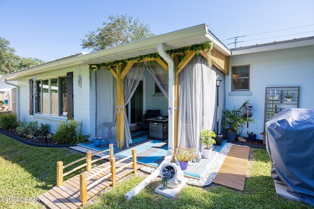 single story home featuring a garage and a front yard