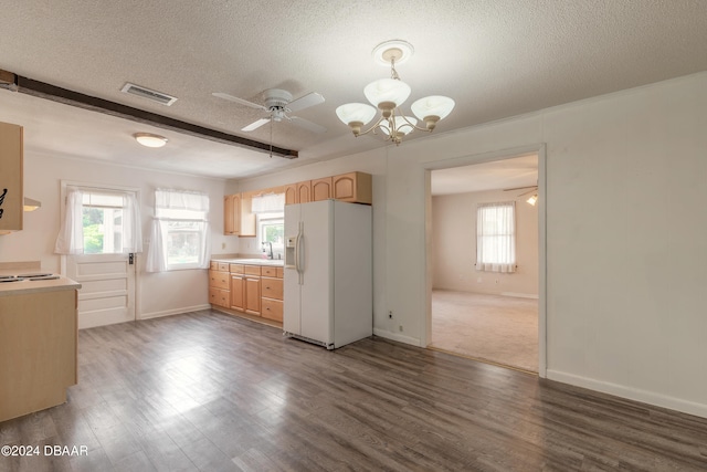 kitchen with a healthy amount of sunlight, light brown cabinets, a textured ceiling, white refrigerator with ice dispenser, and ceiling fan with notable chandelier