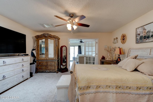 144 Herring Gull Ct, Daytona Beach, FL 32119 - bedroom with carpet, a textured ceiling, and ceiling fan